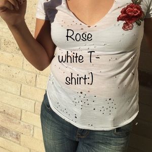 White blouse with a rose the holes are  a design